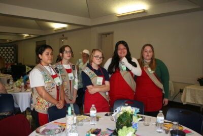 Girl Scout volunteer servers